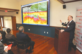 Dr. Harry Kolar of IBM Research unveils a high-resolution contour map of the lake begun by the Jefferson Project in autumn, 2013, at the Kelly Visualization Lab at RPI’s Darrin Freshwater Institute in Bolton Landing. “It is the most detailed study of any lake of this size ever, anywhere,” Kolar told an audience that included the Jefferson Project’s three founders; Jeff Killeen, Dr. Shirley Jackson and Dr. John E. Kelly